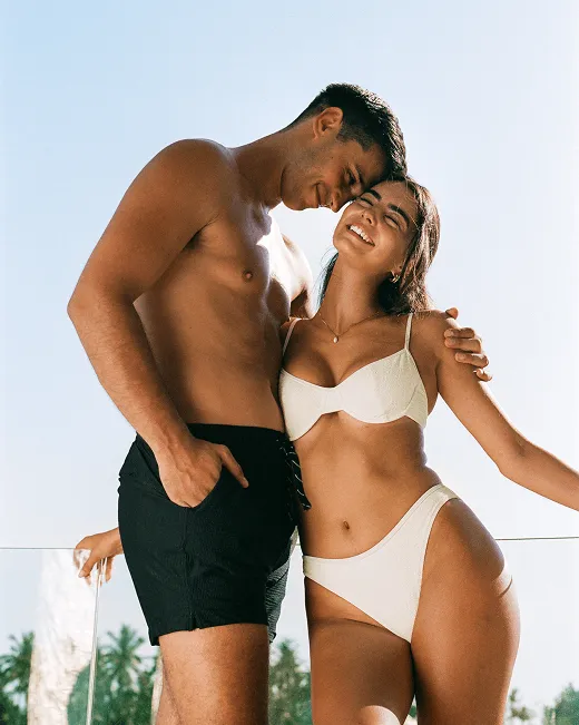 Left : Men's Swim Shorts in Black, Right: Fiona Top & Lydia Bottoms in Vanilla Rum Jacquard